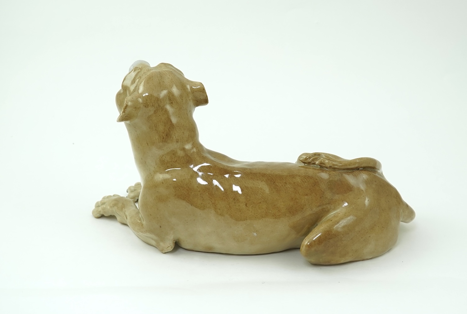 A Meissen model of a recumbent lioness, after J. J. Kandler, 19th century